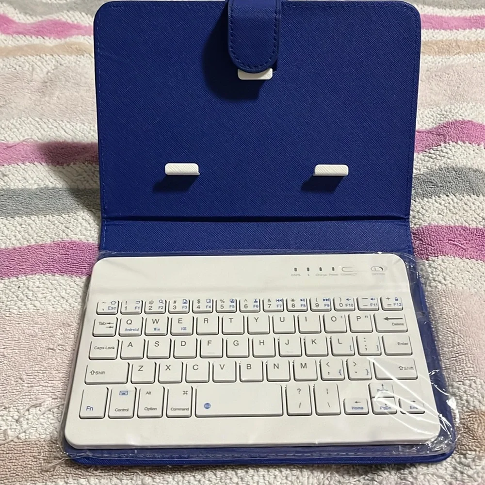 Blue tablet case with keyboard with locking mechanism for tablet